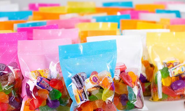 Rows of colourful party sweet bags prepared for a children's celebration