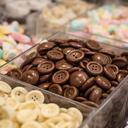 Chocolate buttons displayed in a sweet shop pick and mix section