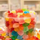 Colourful jelly sweets in a clear pick and mix tub