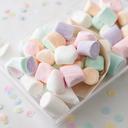 Soft marshmallows arranged for children's sweet cones